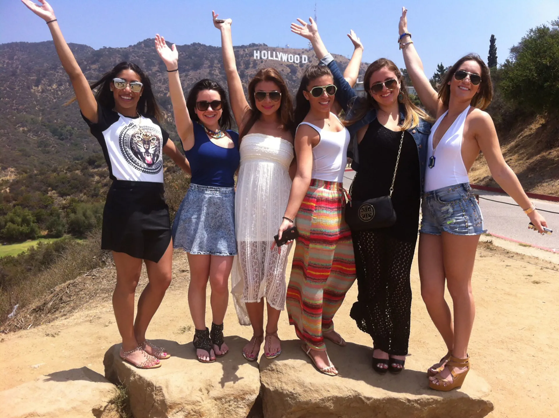 Six-Girls-waving-Hollywood-Sign-LATCB