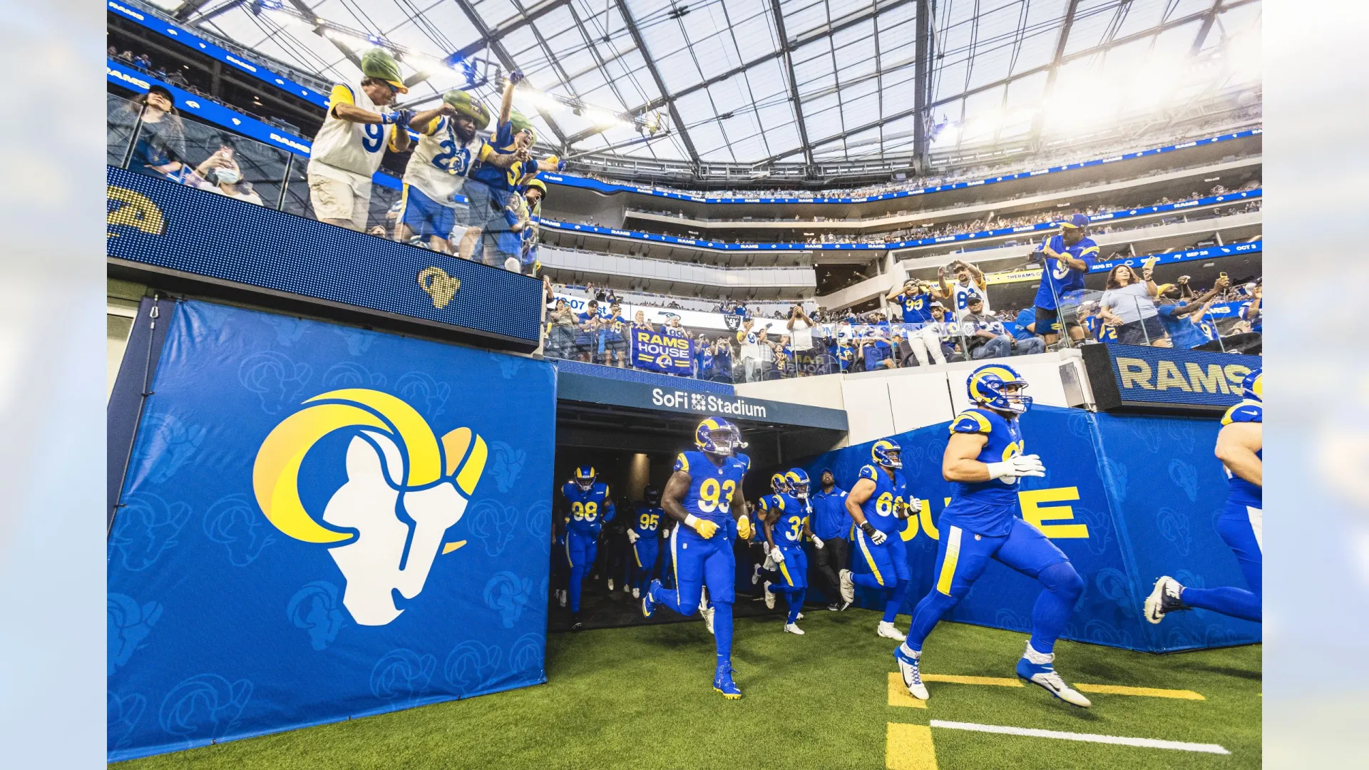 The Los Angeles Rams run out of the tunnel at SoFi Stadium.