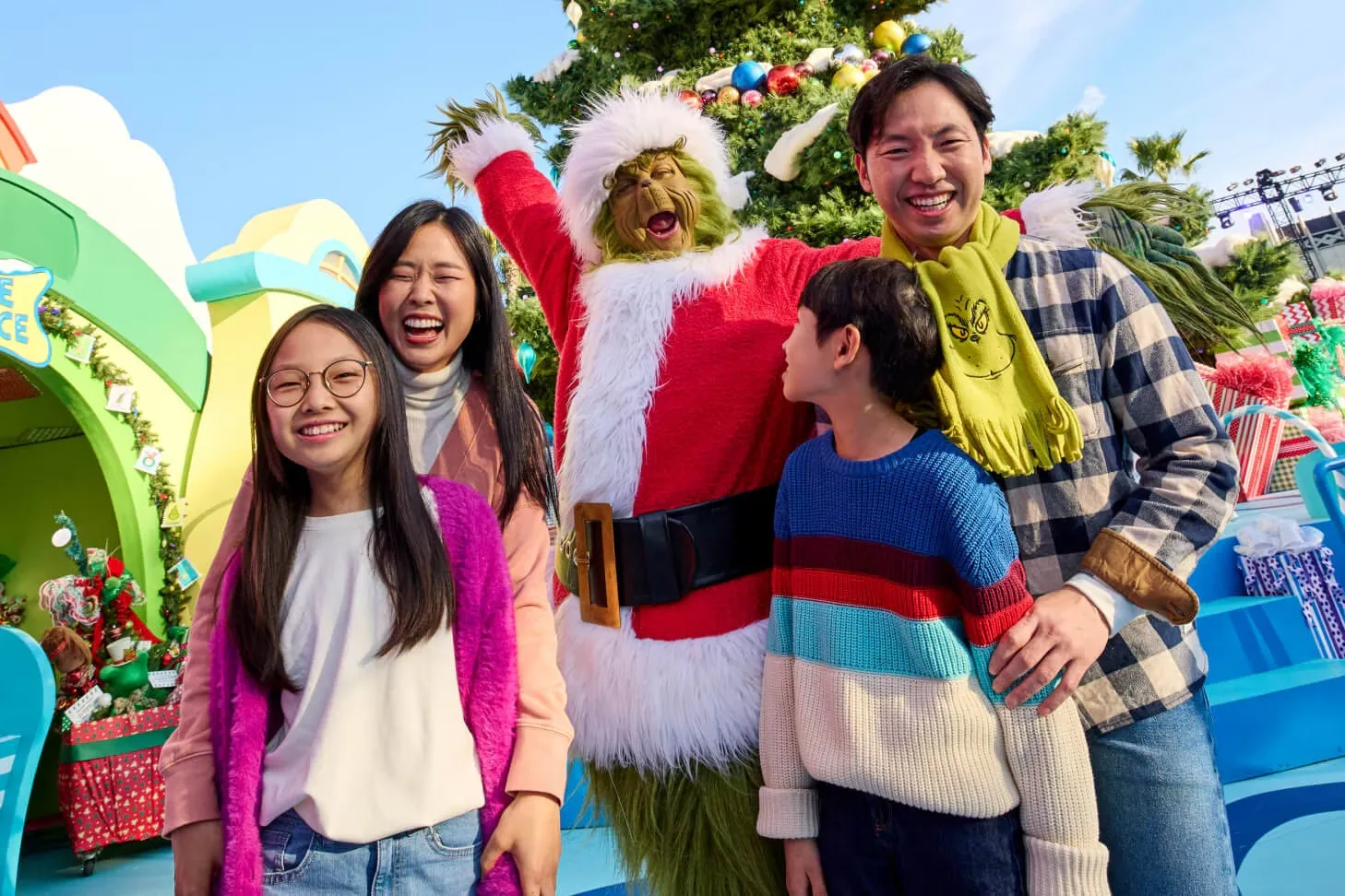 Family photo with The Grinch at Grinchmas